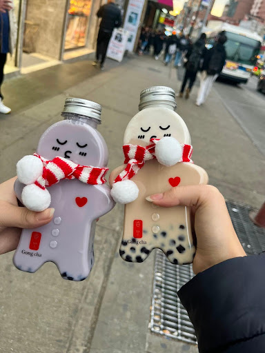To the left is a regular taro boba, and to the right is the limited edition gingerbread boba drink.