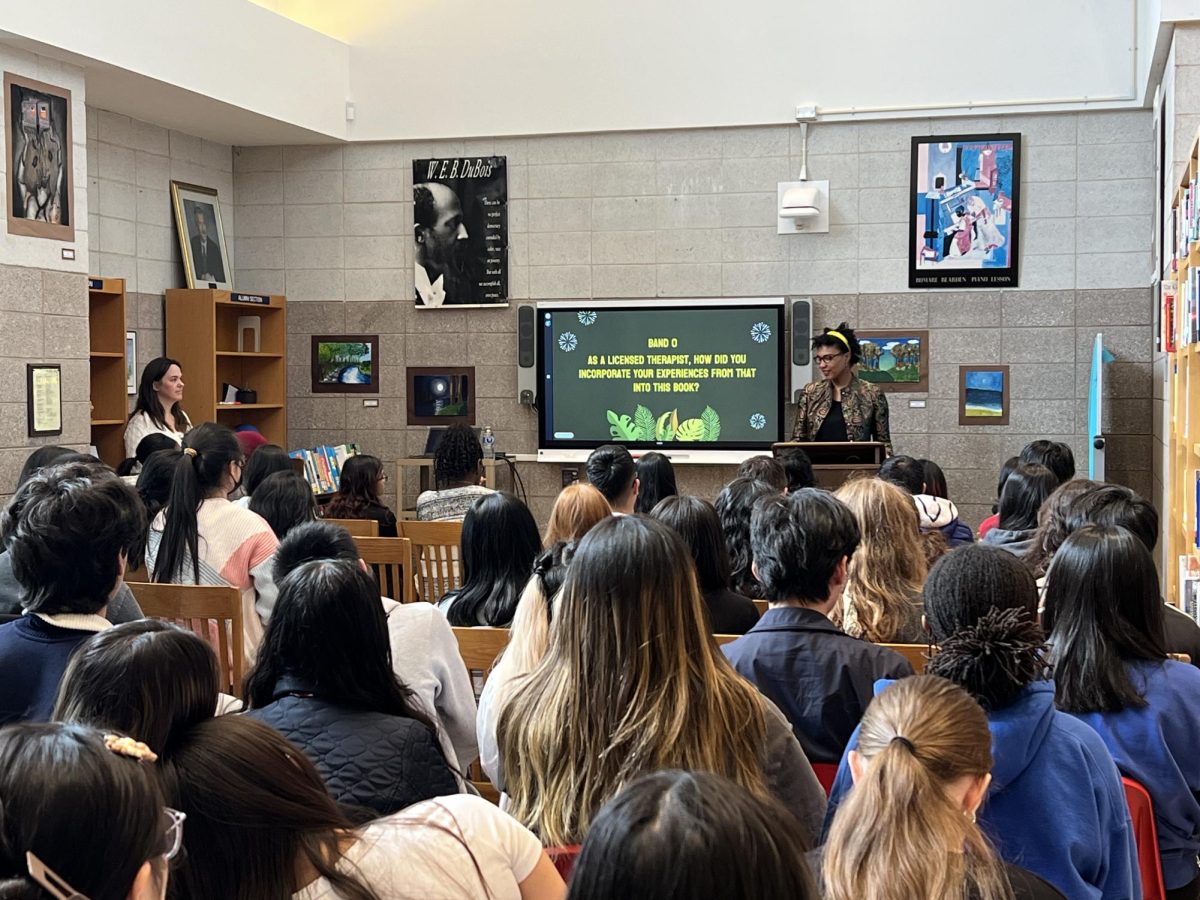 AP Literature students listen as author Soraya Palmer addresses them in the THHS library.