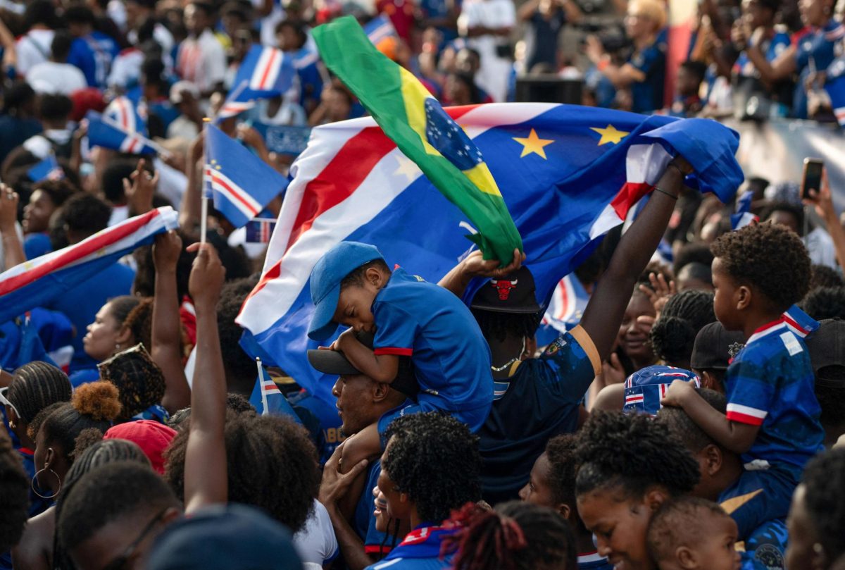 Cape Verde national soccer team fans wave their flags as they watch a World Cup group stage match against Spain, in Praia, Cape Verde, June 15, 2026. REUTERS/Danilson Sequeira
